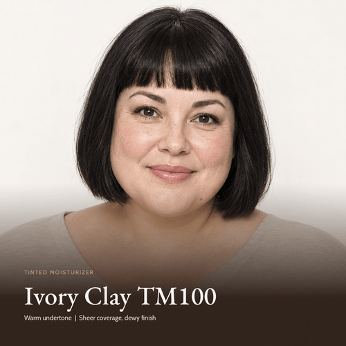 Model wearing Tinted Moisturizer in Ivory Clay TM100