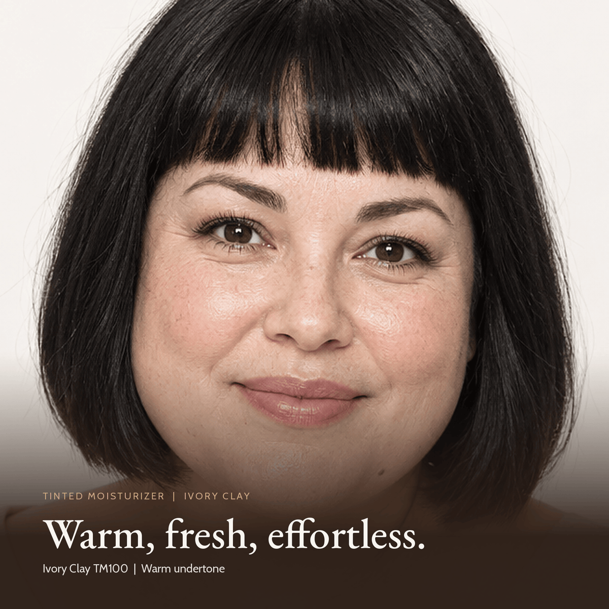 Close-up of model wearing Tinted Moisturizer in Ivory Clay