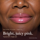 Model wearing True Shine Lip Gloss, Tropical LG27