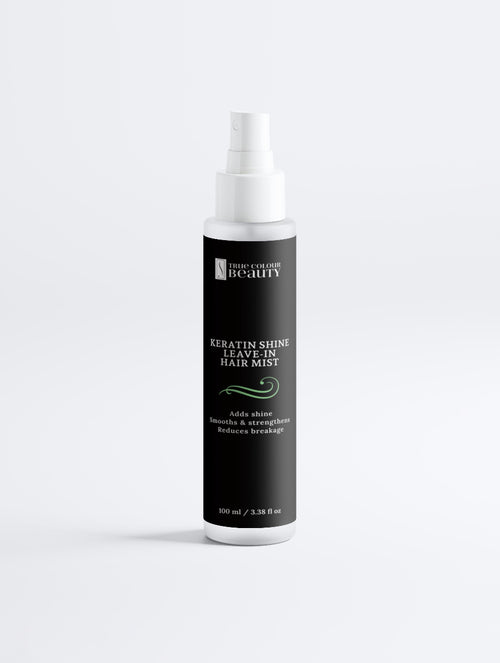 Bottle of Keratin Shine Leave-In Hair Mist on a white background