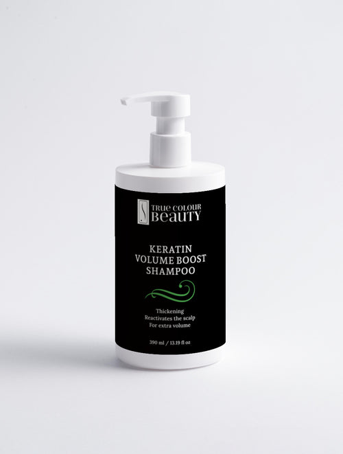 Bottle of Keratin Volume Boost Shampoo with a black label on a white background